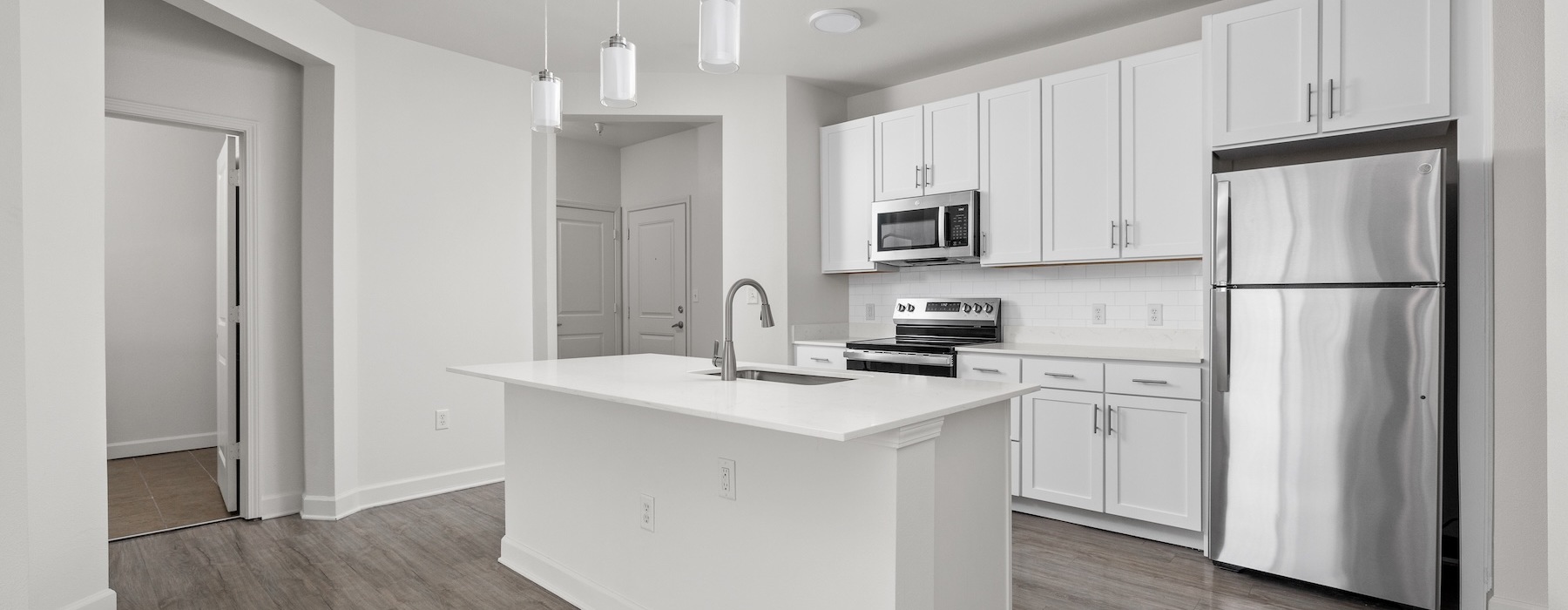 a kitchen with stainless steel appliances
