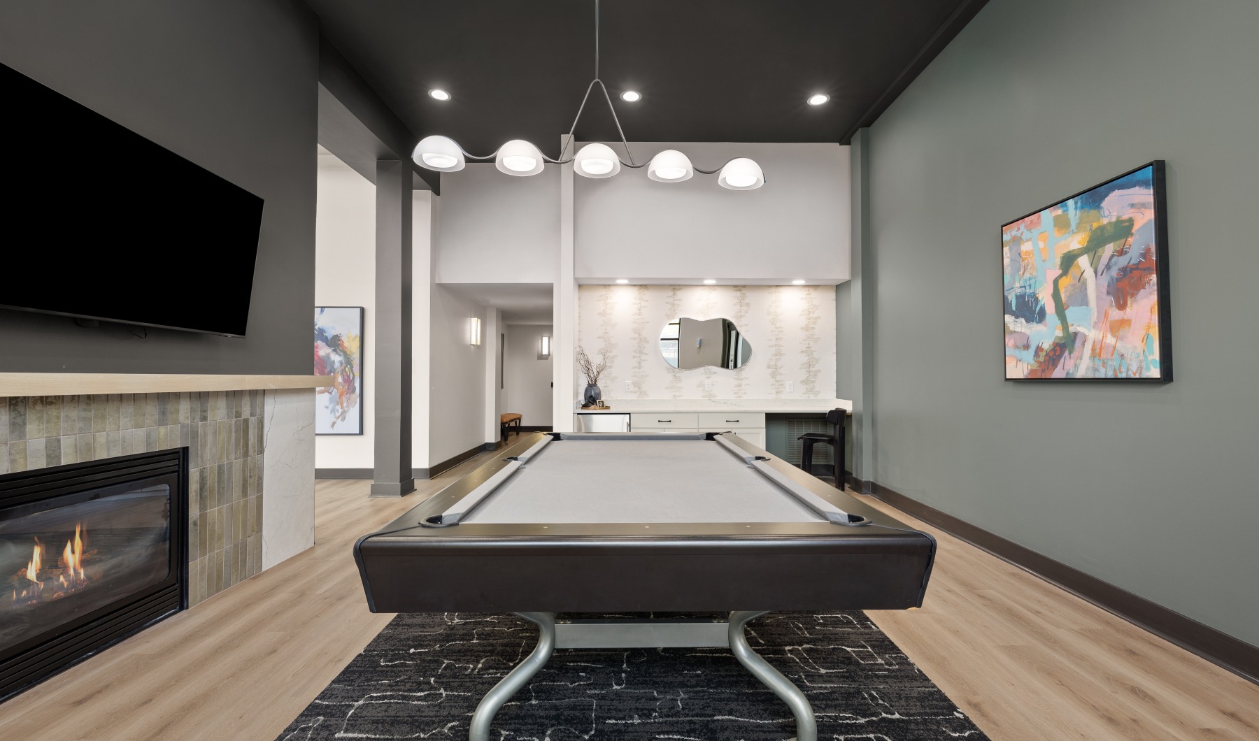 modern game room with a billiards table