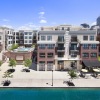 a large building with a body of water in front of it