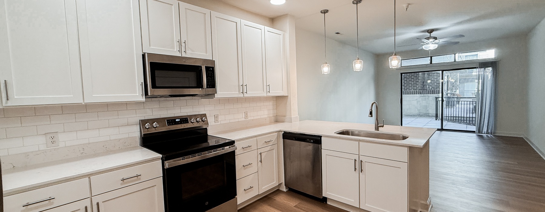 Kitchen view with island and pendant lighting